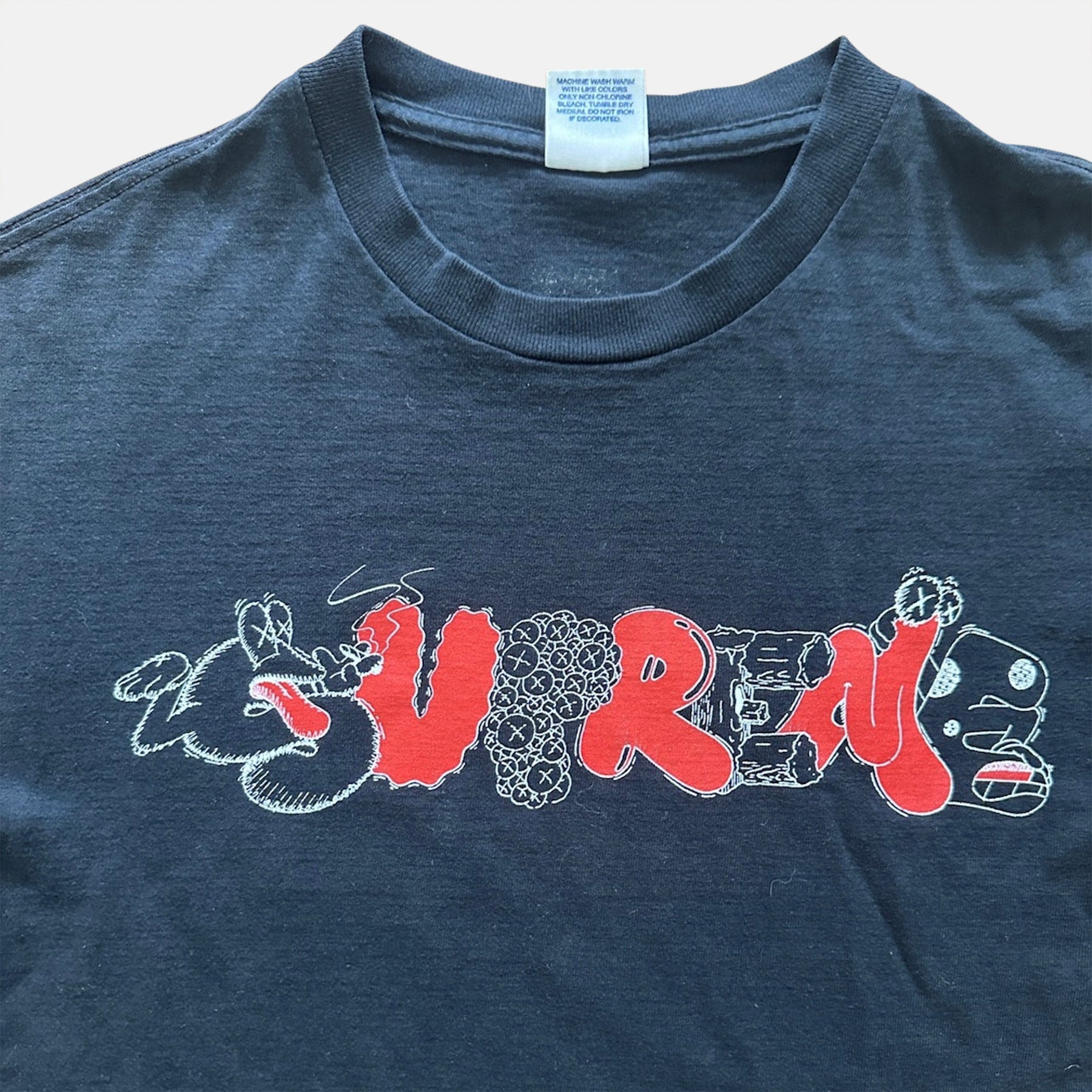 Buy Supreme kaws tee